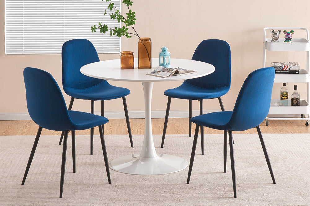 Round dining table set with blue velvet chairs